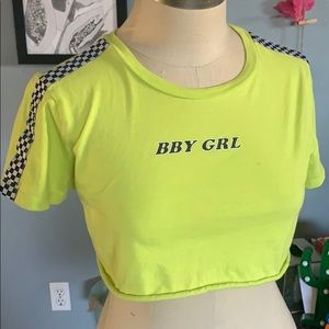 Mini neon yellow crop top with bbygirl on it.